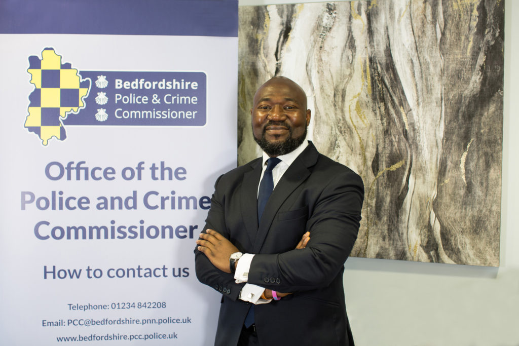 Festus Akinbusoye has been elected as Bedfordshire’s new Police and Crime Commissioner (PCC).  Festus was the Conservative candidate for the May 2021 election and brings a wealth of experience including serving as a Special Constable with Bedfordshire Police. The Commissioner said “I pride myself on maintaining valuable relationships with Councillors on local issues, Members of Parliament on national matters and advising government ministers on issues ranging from drugs policies to better supporting victims of domestic abuse. I also place high value on speaking to the community directly and listening to their concerns” Festus also served as a link governor for the Offender Learning and Skills Services team which delivered training and education in prisons. His passion for working with youths doesn’t stop there, he is a former Parish Councillor and he worked with the Council to get funding for a Youth Club following a rise in anti-social behaviour.   The Office of the Police and Crime Commissioner is now working with Festus to deliver a Police and Crime Plan based on the manifesto he was elected upon. Invest to bring back community-based policing for both our urban and rural communities Tackle drug dealing, antisocial behaviour and the causes of these crimes Support law-abiding citizens' rights to a peaceful life in our county and put victims' needs first Lead a multi-agency approach to early intervention and tackling re-offending Lead an open and transparent policing area.   Chief Executive for the Office of the Police and Crime Commissioner said “ My office has welcomed Festus on his first day as he takes the oath of a Commissioner. We have been working on his commitments made during the election and will now begin the process of engaging our partners, Bedfordshire Police and most importantly the people of Bedfordshire on the Police and Crime Plan that will be launched this summer.”   Chief Constable Garry Forsyth said: “I’m really pleased to welcome X into the role and I am looking forward to working closely with them over the coming years. “Bedfordshire is a vibrant county with fantastic communities, but also some really difficult and complex challenges and it is the Commissioner’s role to hold me accountable on how the force tackles such issues to keep our residents safe.”   The Commissioner added “As I begin my engagements with both residents and businesses I will be opening up communication for full conversations across different platforms. Meeting you where I can, live streaming key events and sharing information on our new website xxxxxxxxxxxxxx.   I look forward to taking up this challenge to be your Commissioner, getting things done”
