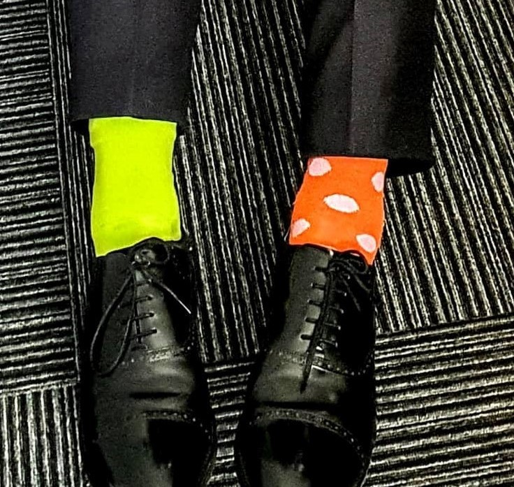 PCC Festus Akinbusoye with mismatch socks for national odd socks day