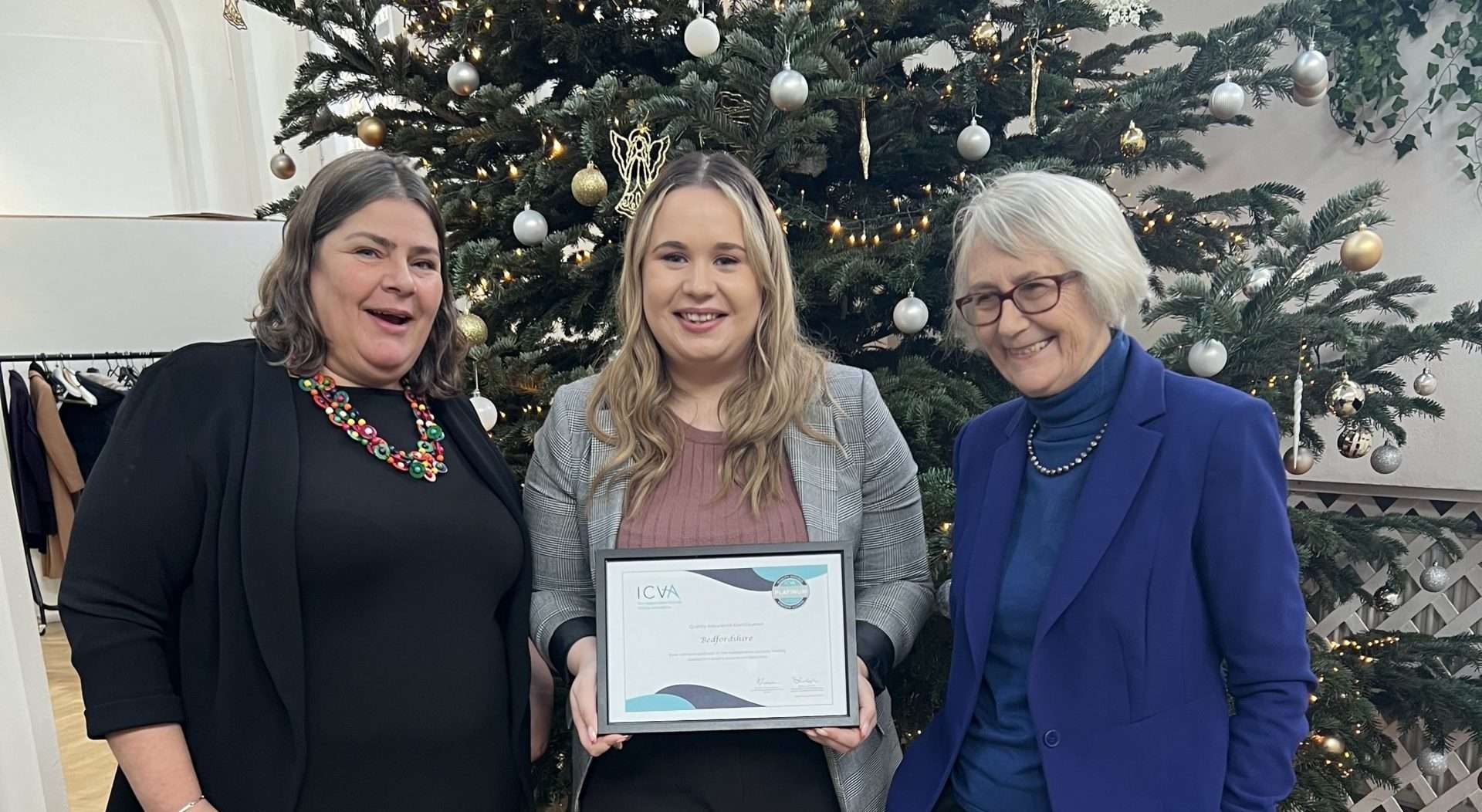 Sherry Ralph Chief Executive of Independent Custody Visiting Association (left), Bethany Coles Scheme Manager for Bedfordshire OPCC (middle) with award, Dame Anne Owers chair of ICVA (right)